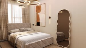 Modern small bedroom with neutral tones, upholstered double bed, abstract wall art, ring pendant lighting, and a curved full-length mirror in a redesigned Dutch gemeente apartment.
